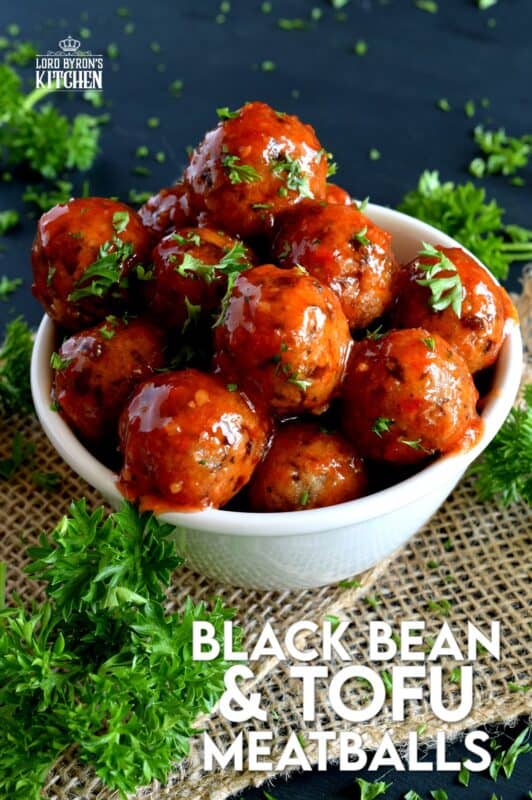 Black Bean and Tofu Meatballs are moist, flavourful, and vegetarian! Seasoned with familiar herbs and spices, and tossed in the sauce of your choice, these meatballs aim to please, and they do just that! Serve these as an appetizer, with your favourite pasta, or as I like to do, with piping hot mashed potatoes! #meatballs #blackbean #tofu #vegetarian
