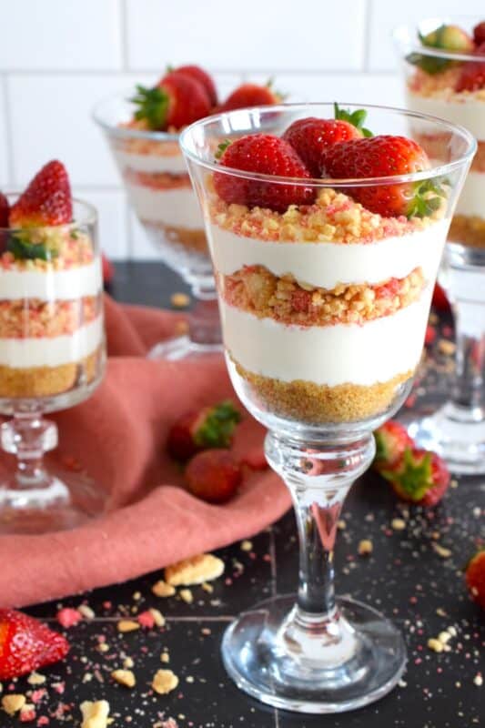 No-Bake Strawberry Shortcake Cheesecake is a darlingly delectable treat fit for any occasion, but it just might be better suited for a special Valentine or when locally grown strawberries are in season! If you're hosting a dinner party, this dessert can be prepared a day in advance, freeing up your valuable time! #strawberry #shortcake #cheesecake #nobake