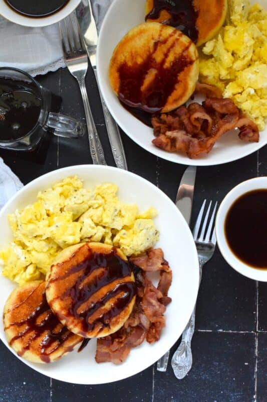 Every Newfoundlander knows well the taste of a properly prepared touton.  The simplicity of these, combined with patience, is what makes them so good!  The only question that remains is what do you top them with?  Serve toutons with eggs and bacon for a complete breakfast! #toutons #newfoundland #breakfast #breaddough #frieddough