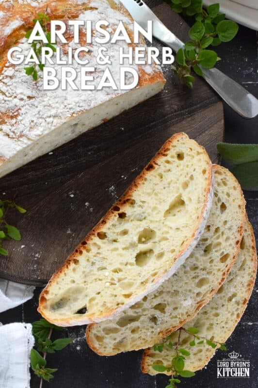 Freshly baked homemade bread is the ultimate comfort food.  There really is nothing like it!  Artisan Garlic and Herb Bread is one of the most delicious and easiest breads you’ll ever make! Loaded with fresh chopped garlic and herbs, this bread is quite aromatic and very savoury! #bread #noknead #dutchoven #homemade #garlic #herbs