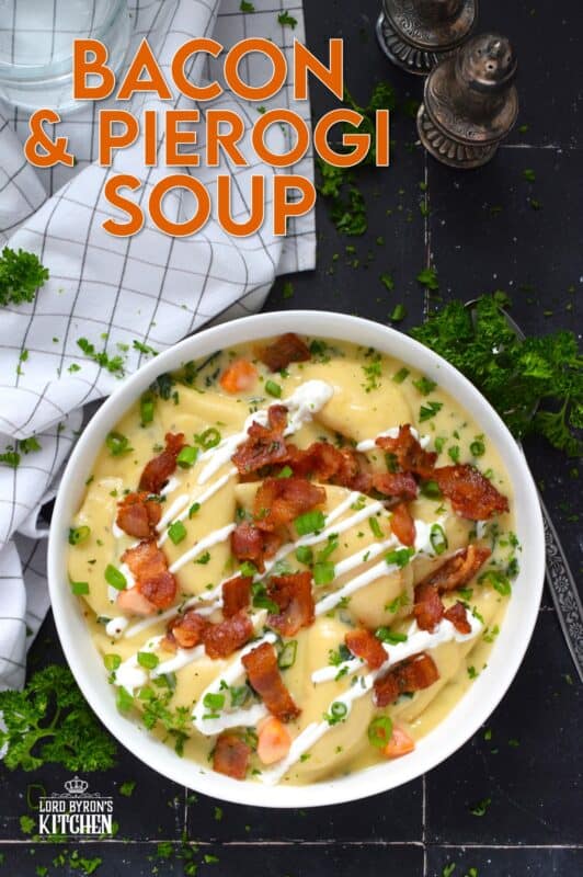 Bacon and Pierogi Soup starts with crispy, fried bacon being tossed with fragrant rosemary. Next, aromatic vegetables like carrots, onions, and celery are added to the pot with garlic and thyme. Frozen pierogies are added and cooked in a thick soup with shredded cheese. Ladle up a big bowl and top it with that rosemary-infused bacon, sour cream, and more cheese. #soup #pierogi #bacon