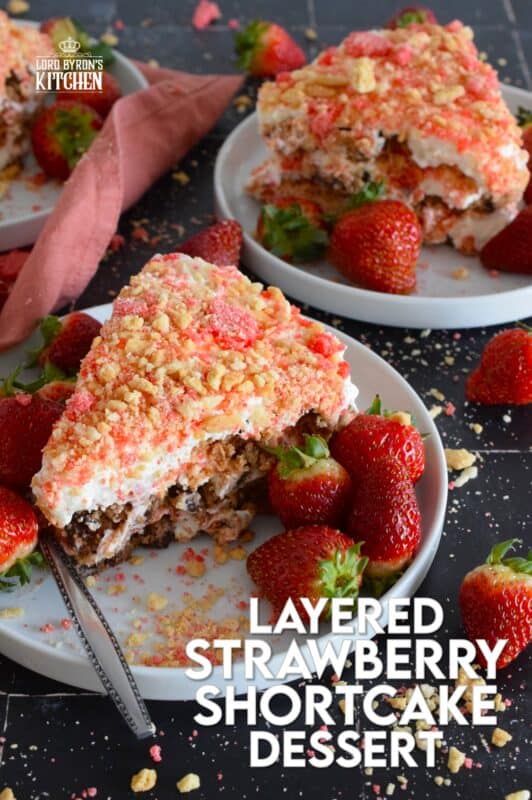 A no-bake dessert that is best prepared in advance and refrigerated overnight, this delicious Layered Strawberry Shortcake Dessert uses homemade strawberry shortcake crumbs, chocolate chip cookies, and a cream cheese-based cream topping. Serve with fresh strawberries! #strawberry #shortcake #dessert #layered #cookies #creamcheese