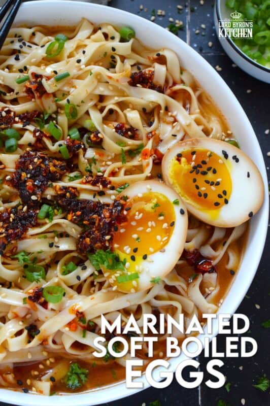 The perfect addition to any piping hot bowl of ramen or spicy noodles, Marinated Soft Boiled Eggs add flavour and texture. The velvety consistency of that golden yellow yolk offers a touch of creaminess and smoothness to soups and noodles. Try chopping a couple of these eggs over steamed rice too! #marinated #asian #softboiled #eggs #soyeggs #korean