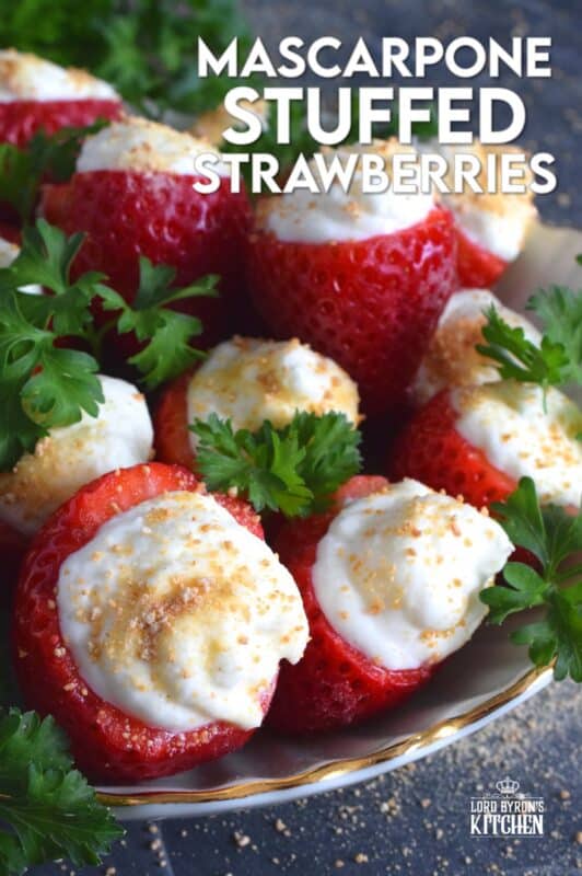 Mascarpone is blended with cream, sugar, and vanilla to make the most delicious dessert topping. In this recipe, the mixture is stuffed into hulled fresh strawberries and topped with a sprinkling of graham cracker crumbs for texture and flavour. This simple and easy dessert is big on taste! #mascarpone #stuffed #strawberries #nobake #dessert