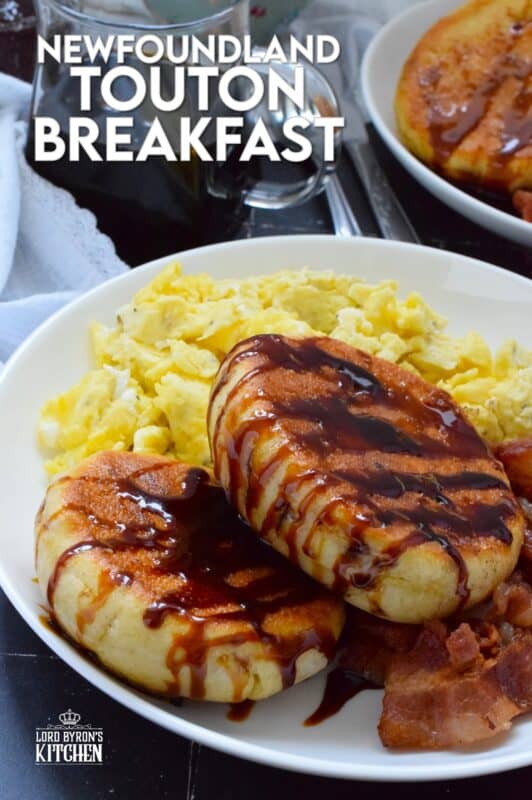 Every Newfoundlander knows well the taste of a properly prepared touton.  The simplicity of these, combined with patience, is what makes them so good!  The only question that remains is what do you top them with?  Serve toutons with eggs and bacon for a complete breakfast! #toutons #newfoundland #breakfast #breaddough #frieddough