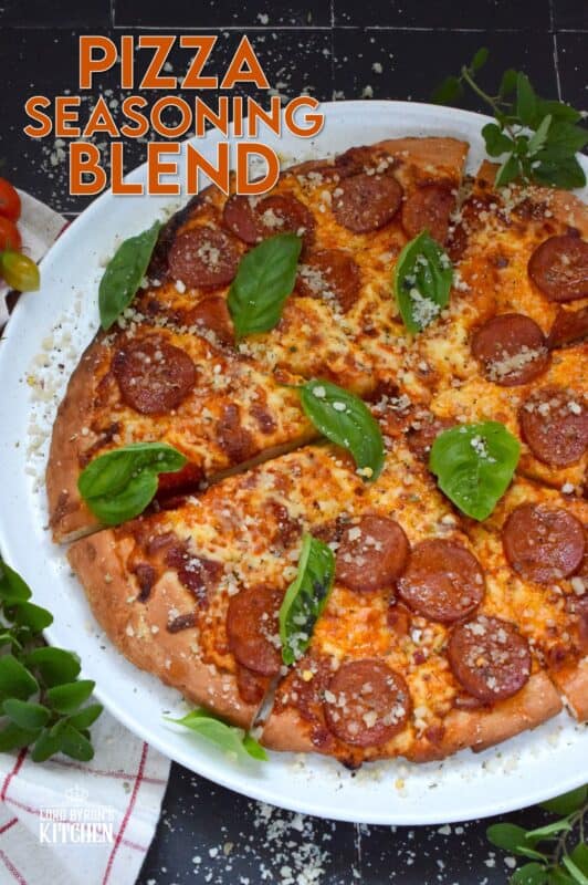 Homemade seasoning blends are the best! All you need is your spice rack and a few minutes to make your own version of this Pizza Seasoning Blend. It will open up lots of recipe possibilities and save you money too! Prepared with what most of us have in our spice racks already, this blend will keep in your fridge for months! #pizza #seasoning #blends #parmesan