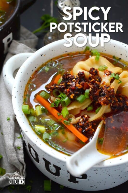 Pick up a package of frozen potstickers, wontons, or dumplings from your local grocery store and cook them in a savoury broth to make the most deliciously wonderful Spicy Potsticker Soup. Loaded with green onions, garlic, ginger, and carrots, this soup is good for you too! #spicy #potsticker #wonton #gyoza #stew #soup #chili #chilicrunch