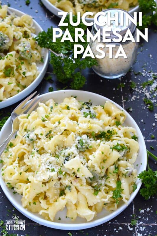 Perfectly cooked pasta is tossed with shredded zucchini that has been sauteed in butter with garlic, shallots, and chilies. Topped with loads of fresh parmesan and your choice of herbs, Zucchini Parmesan Pasta is a quick and easy meal perfect for a family dinner or a meal for one while sitting on the couch with a movie! #zucchini #parmesan #pasta #vegetarian