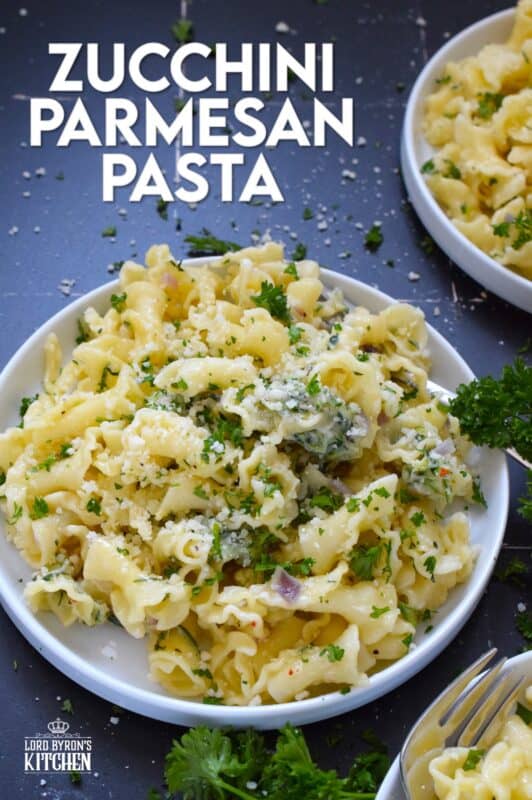 Perfectly cooked pasta is tossed with shredded zucchini that has been sauteed in butter with garlic, shallots, and chilies. Topped with loads of fresh parmesan and your choice of herbs, Zucchini Parmesan Pasta is a quick and easy meal perfect for a family dinner or a meal for one while sitting on the couch with a movie! #zucchini #parmesan #pasta #vegetarian