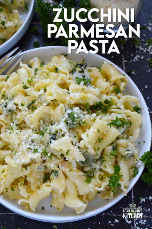 Perfectly cooked pasta is tossed with shredded zucchini that has been sauteed in butter with garlic, shallots, and chilies. Topped with loads of fresh parmesan and your choice of herbs, Zucchini Parmesan Pasta is a quick and easy meal perfect for a family dinner or a meal for one while sitting on the couch with a movie! #zucchini #parmesan #pasta #vegetarian