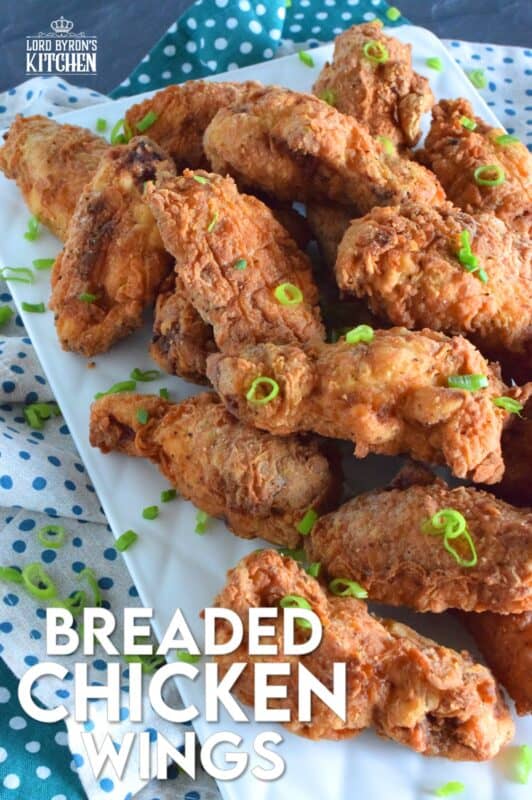 Forget those Breaded Chicken Wings in the frozen section of your local grocery store! This homemade version has better flavour, more crunch, and most certainly way more bang for your buck. These are great just the way they are, or toss them in your favourite wing sauce! #wings #chicken #breaded #fried