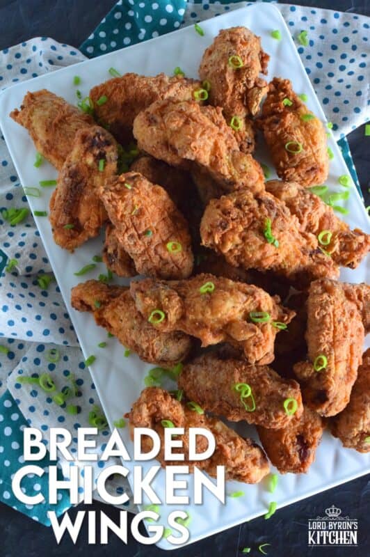 Forget those Breaded Chicken Wings in the frozen section of your local grocery store! This homemade version has better flavour, more crunch, and most certainly way more bang for your buck. These are great just the way they are, or toss them in your favourite wing sauce! #wings #chicken #breaded #fried