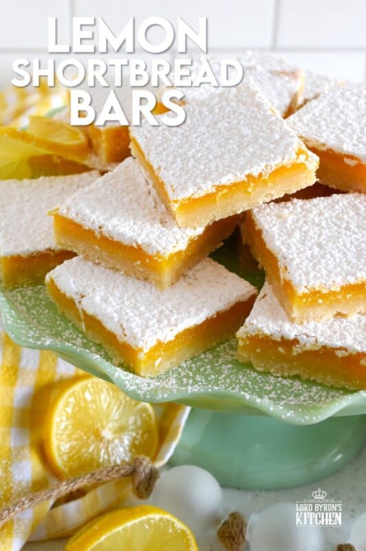 Pucker up! These Lemon Shortbread Bars are perfectly balanced with tartness from the lemons and sweetness from the sugar. The easy to prepare lemon filling is baked right on top of that homemade buttery shortbread crust. Perfect to serve at Easter brunch, a light and refreshing summer dessert, but so delicious you can whip up a batch of these for any occasion! #lemon #bars #shortbread #easter #squares
