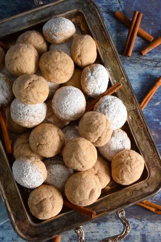 Ricotta is baked into these Ricotta Cinnamon Cookies to help keep them soft and fresh. Even though at first glance these cookies might look rather plain and boring, their flavour is tremendous! Perfectly light, airy, and cinnamon-y, it's hard to eat just one of these delicious treats! #ricotta #cookies #cinnamon #soft #moist