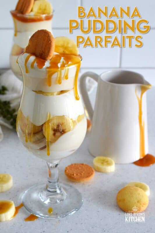 Layers of vanilla wafer cookies, homemade mascarpone cream, banana pudding, and freshly sliced bananas, these parfaits are quick and easy to make! Serve them family style or fancy them up by serving them in these individual glasses. Top with whipped cream and an optional caramel drizzle. They're a feast for the eyes! #banana #pudding #parfait #nobake #layered #dessert