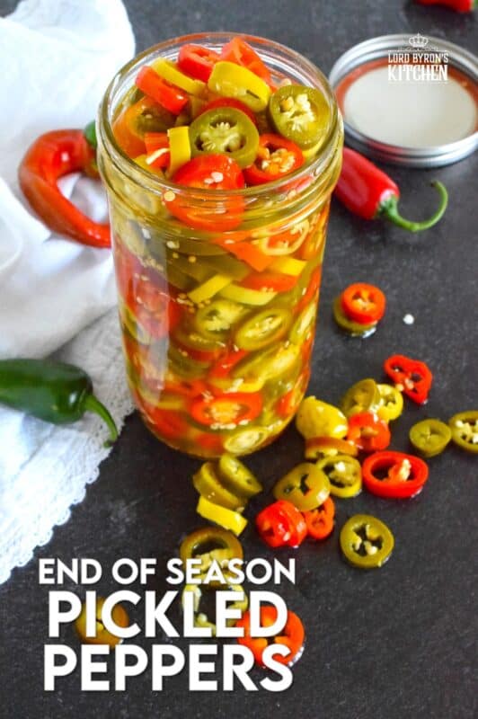 Sadly, summer does come to an end and with it, the last of your hot pepper harvest. When left with a bunch of hot peppers of mixed variety, prepare a big jar of these End of Season Pickled Peppers. No canning is required here! Fashioned with a quick pickle brine, these will keep safely in your refrigerator for two to three months! #pickled #hot #peppers #quick #brine #summer