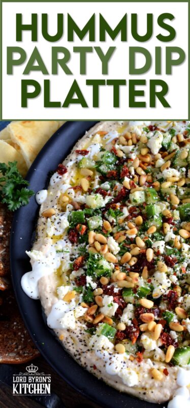 What's a party without dip? Hummus Party Dip Platter is a large, layered dip that's just perfect for entertaining a crowd. This all-in-one dip has hummus, sour cream, pine nuts, sun dried tomatoes, cucumbers, feta, and a few other ingredients too! Serve this on any occasion for a delicious, crowd-pleasing appetizer! #hummus #dip #appetizer #party #platter #spread