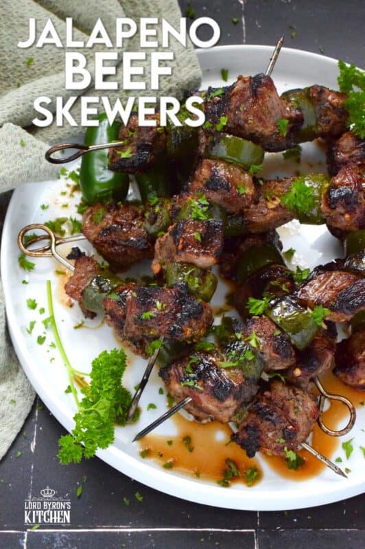 Marinated steak is skewered and grilled to perfection in this spicy Jalapeno Beef Skewers recipe. The marinade tenderizes the beef and the sliced jalapenos add flavour and spice. Quickly grilled over high heat, this beef is nicely browned and charred on the outside with a perfectly medium-cooked interior. #beef #steak #bbq #grilled #skewers #jalapeno