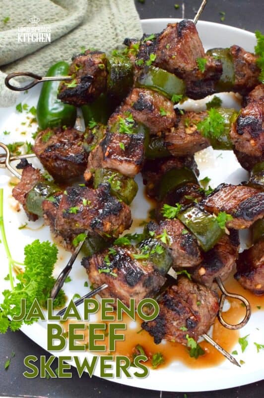 Marinated steak is skewered and grilled to perfection in this spicy Jalapeno Beef Skewers recipe. The marinade tenderizes the beef and the sliced jalapenos add flavour and spice. Quickly grilled over high heat, this beef is nicely browned and charred on the outside with a perfectly medium-cooked interior. #beef #steak #bbq #grilled #skewers #jalapeno