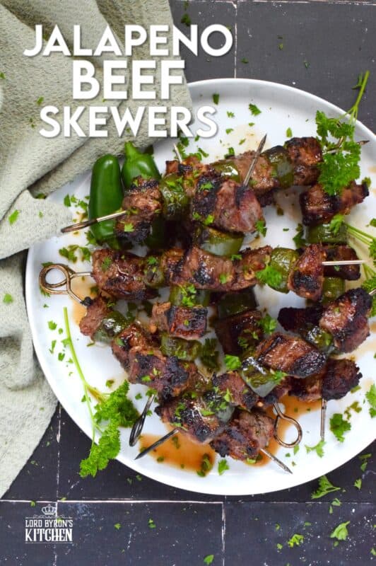 Marinated steak is skewered and grilled to perfection in this spicy Jalapeno Beef Skewers recipe. The marinade tenderizes the beef and the sliced jalapenos add flavour and spice. Quickly grilled over high heat, this beef is nicely browned and charred on the outside with a perfectly medium-cooked interior. #beef #steak #bbq #grilled #skewers #jalapeno