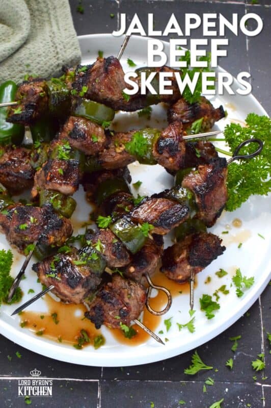 Marinated steak is skewered and grilled to perfection in this spicy Jalapeno Beef Skewers recipe. The marinade tenderizes the beef and the sliced jalapenos add flavour and spice. Quickly grilled over high heat, this beef is nicely browned and charred on the outside with a perfectly medium-cooked interior. #beef #steak #bbq #grilled #skewers #jalapeno