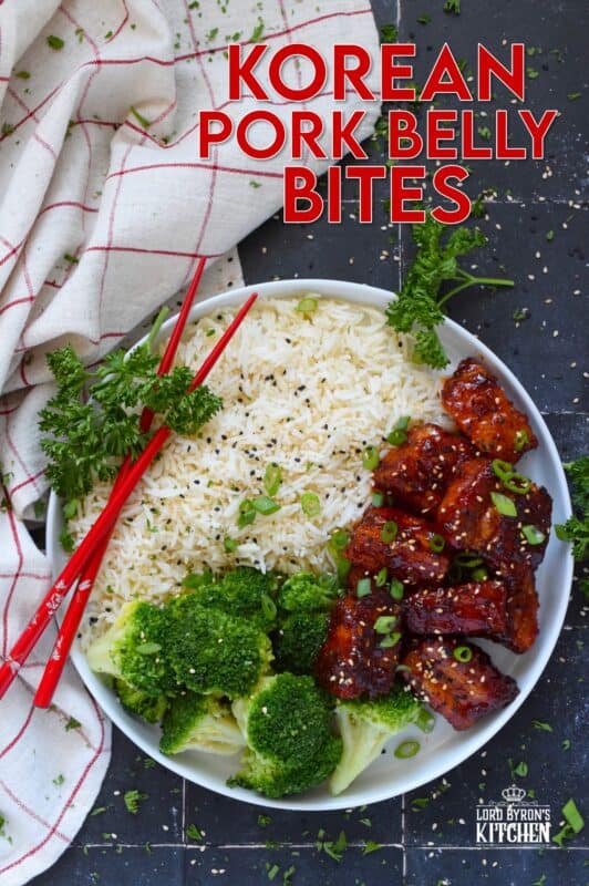 These bite-sized morsels of pork are so quick and easy to prepare! In less than 60 minutes, you can have these delicious Korean Pork Belly Bites on your dinner plate! Prepared with fresh garlic and ginger, and garnished with sliced green onions, expect an explosion of flavour here! #korean #gochujang #porkbelly #pork #oven #asian #sauce