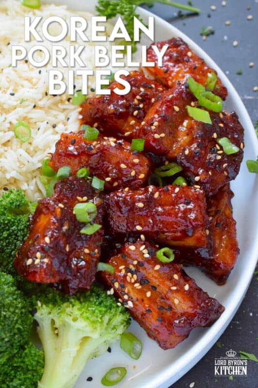These bite-sized morsels of pork are so quick and easy to prepare! In less than 60 minutes, you can have these delicious Korean Pork Belly Bites on your dinner plate! Prepared with fresh garlic and ginger, and garnished with sliced green onions, expect an explosion of flavour here! #korean #gochujang #porkbelly #pork #oven #asian #sauce