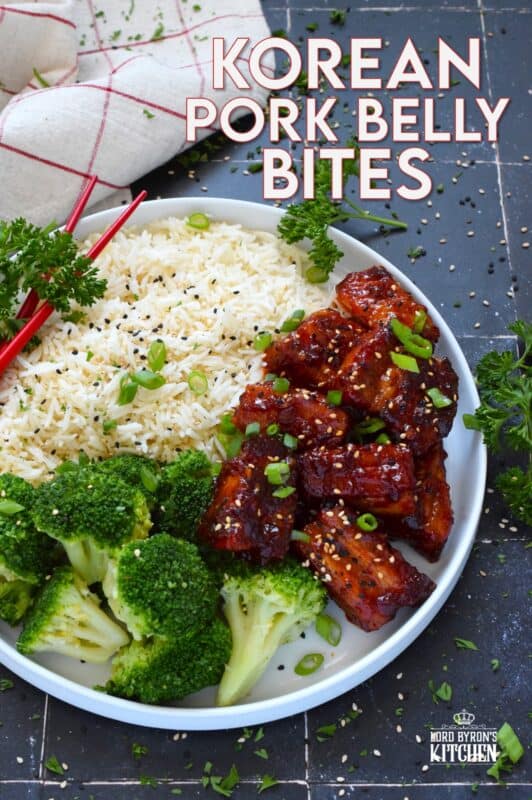 These bite-sized morsels of pork are so quick and easy to prepare! In less than 60 minutes, you can have these delicious Korean Pork Belly Bites on your dinner plate! Prepared with fresh garlic and ginger, and garnished with sliced green onions, expect an explosion of flavour here! #korean #gochujang #porkbelly #pork #oven #asian #sauce