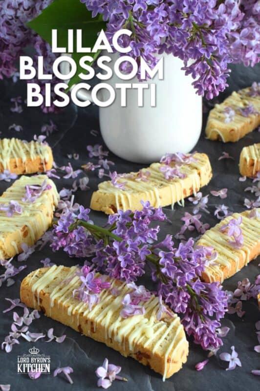 These biscotti are loaded with lilac flavour and scent.  Lilac petals are incorporated into the biscotti dough which has been sweetened with homemade lilac sugar.  Glazed and topped with more lilacs, these Lilac Blossom Biscotti are light, airy, and delicious! Super easy to make, and with their cheerful inclination, no one could resist! Treat yourself to one of these with a hot tea on a lazy Sunday afternoon. #lilac #biscotti #flowers #petals #brunch