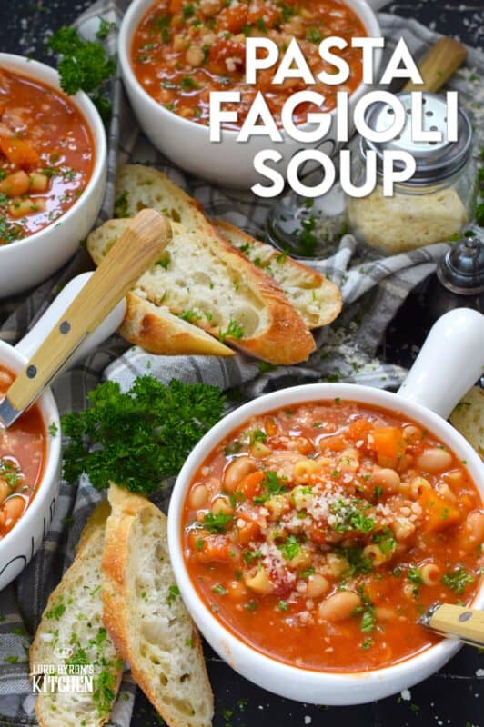 One of the most warming and cozy soups, Pasta Fagioli Soup is prepared with canned cannellini beans, canned tomato sauce, store-bought vegetable stock, dried herbs and seasonings, and a box of pasta. Needless to say, most of the ingredients just might be in your pantry already! About 30 minutes from start to finish is all you need! #soup #pasta #fagioli #vegetarian #beans