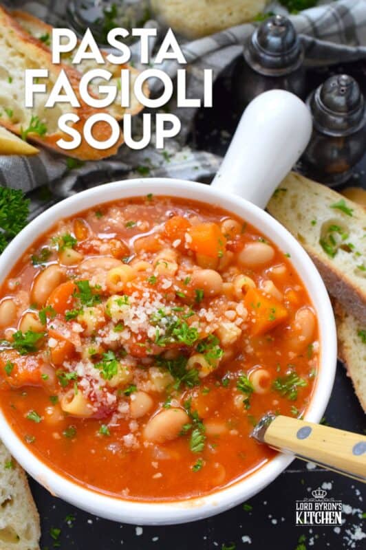 One of the most warming and cozy soups, Pasta Fagioli Soup is prepared with canned cannellini beans, canned tomato sauce, store-bought vegetable stock, dried herbs and seasonings, and a box of pasta. Needless to say, most of the ingredients just might be in your pantry already! About 30 minutes from start to finish is all you need! #soup #pasta #fagioli #vegetarian #beans