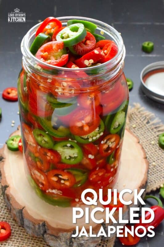 You've been missing out if you’ve never tried Quick Pickled Jalapenos! They are slightly sweet and sour but still hot and spicy! They're great on sandwiches, pizza, nachos, burgers, and scrambled eggs! All you need to prepare these are jalapenos, white vinegar, salt, sugar, and water! There is no canning equipment or knowledge required for quick pickling either! #quick #pickled #jalapenos #homemade