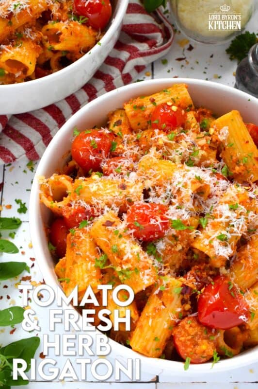 Quick, easy, and delicious describes this Tomato and Fresh Herb Rigatoni! Use fresh cherry tomatoes, thyme and oregano leaves with fresh parsley to make this pasta extra special. The sauce is prepared by blistering the tomatoes in garlic and oil before tossing it with pesto.  Perfect for a weeknight family dinner, this dish takes about 30 minutes from start to finish and you get to dig in and enjoy! #pasta #herbs #fresh #tomato #30minutemeals #familymeals