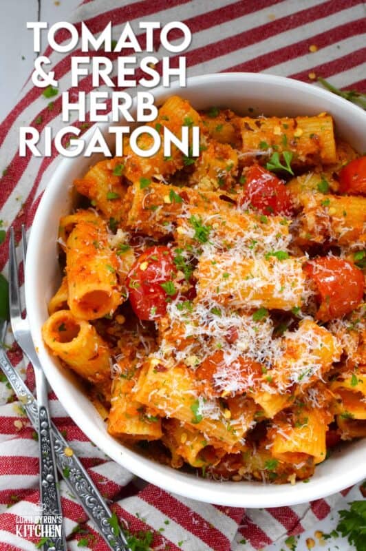 Quick, easy, and delicious describes this Tomato and Fresh Herb Rigatoni! Use fresh cherry tomatoes, thyme and oregano leaves with fresh parsley to make this pasta extra special. The sauce is prepared by blistering the tomatoes in garlic and oil before tossing it with pesto.  Perfect for a weeknight family dinner, this dish takes about 30 minutes from start to finish and you get to dig in and enjoy! #pasta #herbs #fresh #tomato #30minutemeals #familymeals