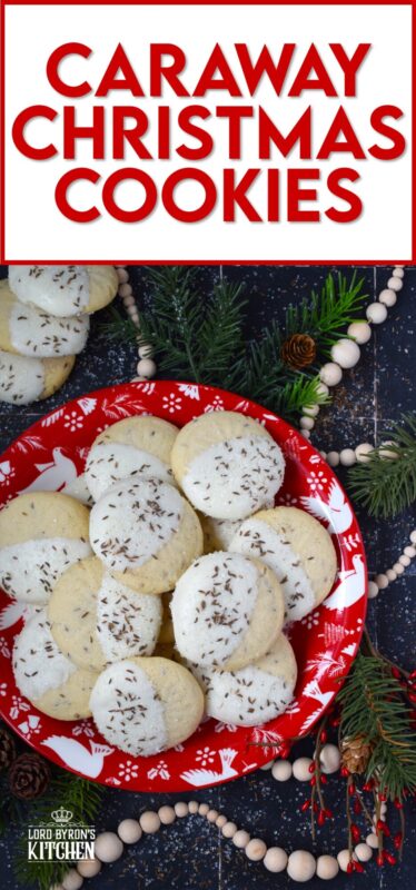 These tender, soft, and moist Caraway Christmas Cookies are prepared with a basic vanilla and caraway seed-flavoured cookie dough. Dipped in melted white chocolate and sprinkled with coarse sanding sugar and more caraway, these cookies are a great addition to any holiday cookie exchange or cookie platter! #caraway #cookies #chocolate #christmas