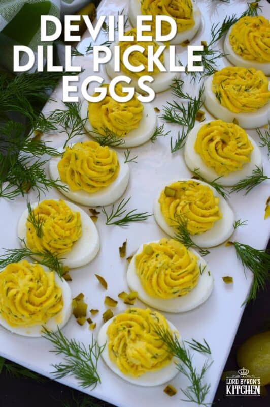 Deviled Dill Pickle Eggs are so delicious and an appetizer or side that can be prepared any time of the year - not just at Easter, which is when most of us tend to prepare them! Prepared with lots of fresh dill and dill pickles, this one is obviously for the dill lover! These are great to serve at a backyard summer BBQ! #dillpickles #deviledeggs #appetizer #dill