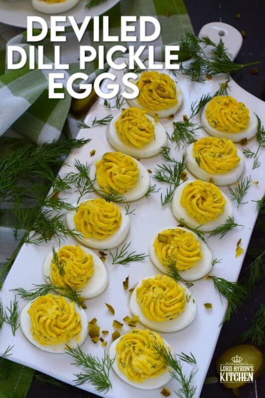 Deviled Dill Pickle Eggs are so delicious and an appetizer or side that can be prepared any time of the year - not just at Easter, which is when most of us tend to prepare them! Prepared with lots of fresh dill and dill pickles, this one is obviously for the dill lover! These are great to serve at a backyard summer BBQ! #dillpickles #deviledeggs #appetizer #dill