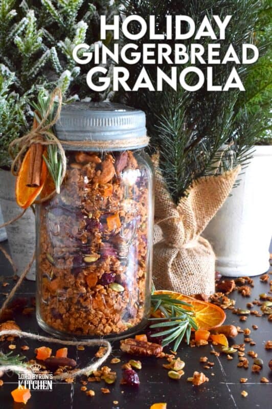 Almonds, cashews, pecans, pumpkin seeds, cranberries, and apricots help to flavour and bulk up this Holiday Gingerbread Granola. Baked with maple syrup and butter, and seasoned with cinnamon, nutmeg, and allspice, this healthy snack makes a very delicious giftable treat! #granola #homemade #gift #gingerbread