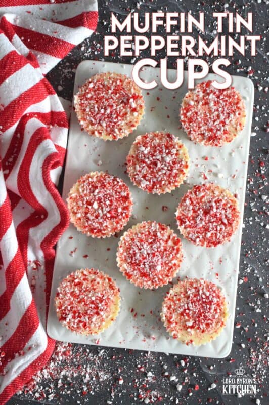 If you can melt chocolate, you can easily make these Muffin Tin Peppermint Cups! A layer of melted milk chocolate is followed by a layer of white melted chocolate and topped with a generous amount of crushed red and white candy canes. Decadent and rich, these festive treats are both fun to prepare and to eat! #melted #chocolate #milk #white #candycane #peppermint #nobake