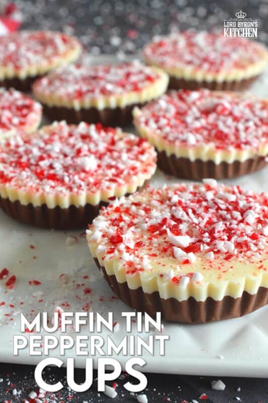 If you can melt chocolate, you can easily make these Muffin Tin Peppermint Cups! A layer of melted milk chocolate is followed by a layer of white melted chocolate and topped with a generous amount of crushed red and white candy canes. Decadent and rich, these festive treats are both fun to prepare and to eat! #melted #chocolate #milk #white #candycane #peppermint #nobake