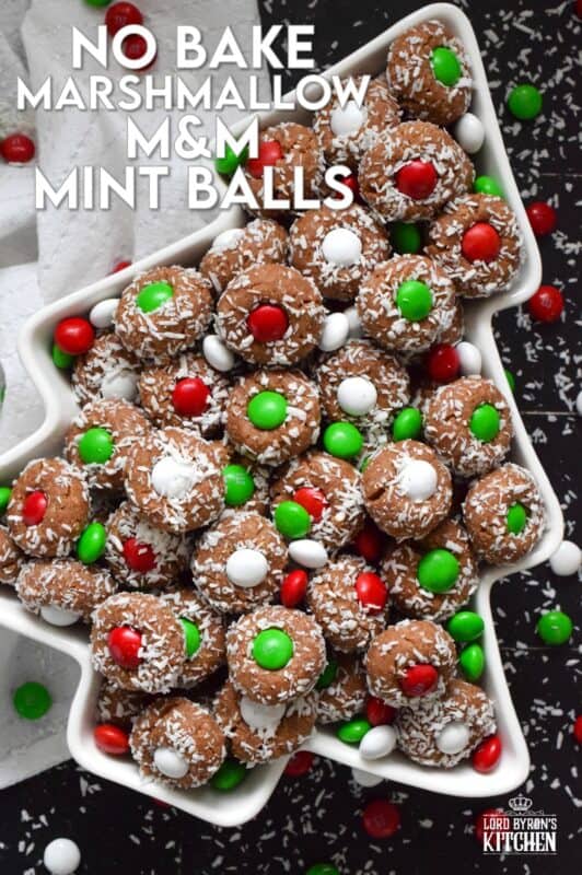 Use melted peppermint flavoured marshmallows in this recipe for even more minty flavour!  Prepared with cocoa, graham crumbs, and coconut, these No Bake Marshmallow M&M Mint Balls are sure to please and delight the peppermint lover in your family! #nobake #mint #dandies #marshmallow #balls #chocolate #candy