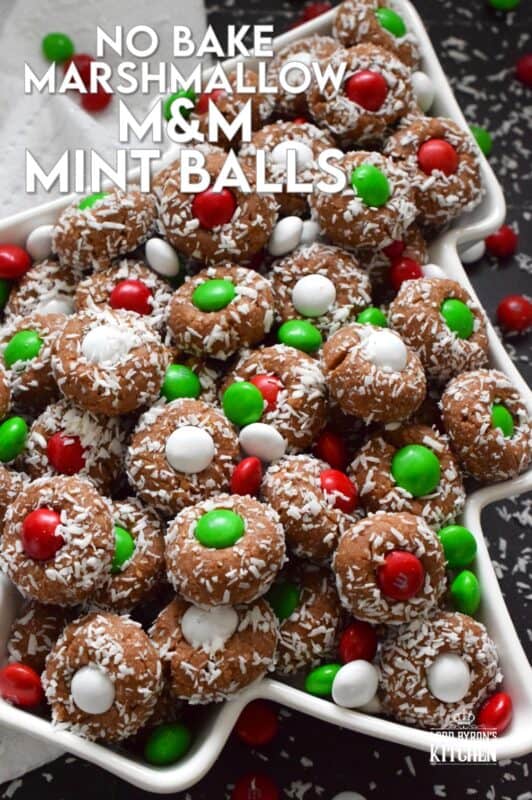 Use melted peppermint flavoured marshmallows in this recipe for even more minty flavour!  Prepared with cocoa, graham crumbs, and coconut, these No Bake Marshmallow M&M Mint Balls are sure to please and delight the peppermint lover in your family! #nobake #mint #dandies #marshmallow #balls #chocolate #candy