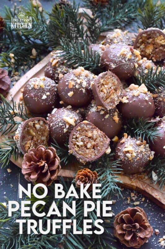 Phenomenal is the only word to describe these No Bake Pecan Pie Truffles! In just a few minutes, the filling is easily prepared and can be made in advance. Roll the filling into balls and dip them into silky smooth melted milk chocolate. Top these truffles with more chopped pecans and enjoy! #pecan #balls #truffles #holiday #chocolate #nobake