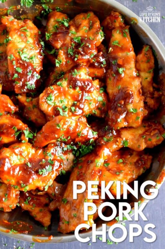 Thin cuts of pork which have been fried and then tossed in a sweet, spicy, and vinegary sauce. Peking Pork Chops are a popular Chinese buffet dish which can be easily made at home too! So fast, so easy, and so simple, these make a great weeknight family dinner option! #pork #buffet #asian #peking
