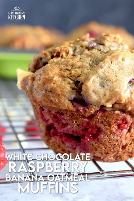 In our home, muffins are considered one of the major food groups, especially if that muffin happens to be these White Chocolate Raspberry Banana Oatmeal Muffins! These disappear before they've had time to cool down! #raspberries #banana #muffins #oatmeal #chocolate