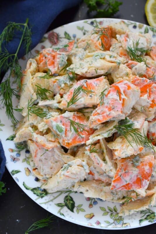 Avoid the overhead prices and prepare this Deli-Style Crab Salad at home! You can use real crab meat or keep it budget-friendly with imitation. Tossed with a dressing comprised of mayonnaise, lemon juice and fresh dill, this salad packs a flavour punch! #seafood #deli #delistyle #crab #salad