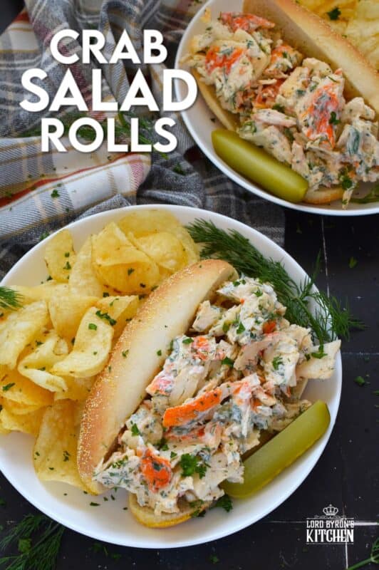 Loaded with crab meat, these Crab Salad Rolls are a fast and easy meal that is easily completed with a handful of really crispy kettle chips! The crab meat is tossed in a savoury thick dressing made with mayonnaise, chives, dill, lemon, and celery. It really does not get any easier or any more delicious than this! #crab #imitation #salad #sandwich #rolls