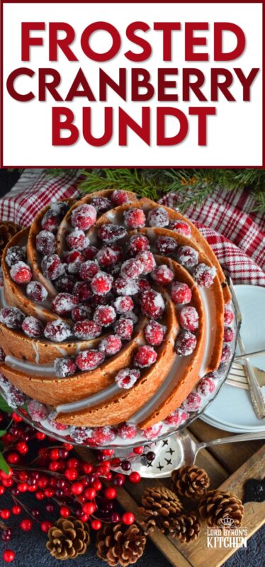 This super easy and beautiful Frosted Cranberry Bundt Cake is loaded with whole, fresh cranberries, frosted with a simple icing, and topped with a sugared cranberry garnish. Tart, sweet, and perfect for any holiday table, this gorgeous, showstopping cake is even more delicious than it looks! #cranberry #bundt #cake #frosted