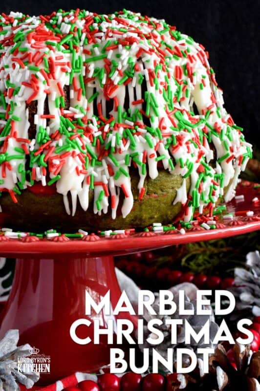 Kids of all ages will love a big slice of this Marbled Christmas Bundt Cake. This cake is festive, colourful, merry, and bright! It's made with yogurt so it will stay beautifully soft and moist. And, no matter what your age, everyone loves sprinkles! #bundt #sprinkles #marble #christmas #cake