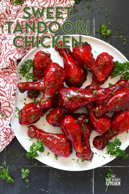 Spicy and flavourful with a slightly smoky taste, this Sweet Tandoori Chicken is mouthwateringly delightful! Tossed in cornstarch and baked in a hot oven, these chicken drumsticks are baked until crisp and then drenched in a sweet and sticky garlicky sauce that takes just minutes to prepare! #tandoori #spicy #chicken #drumsticks #baked
